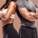 Male and female athlete posing on brown background.