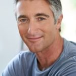handsome mature man relaxing at home